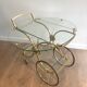 Neo classical style table in silver and gold metal and glass