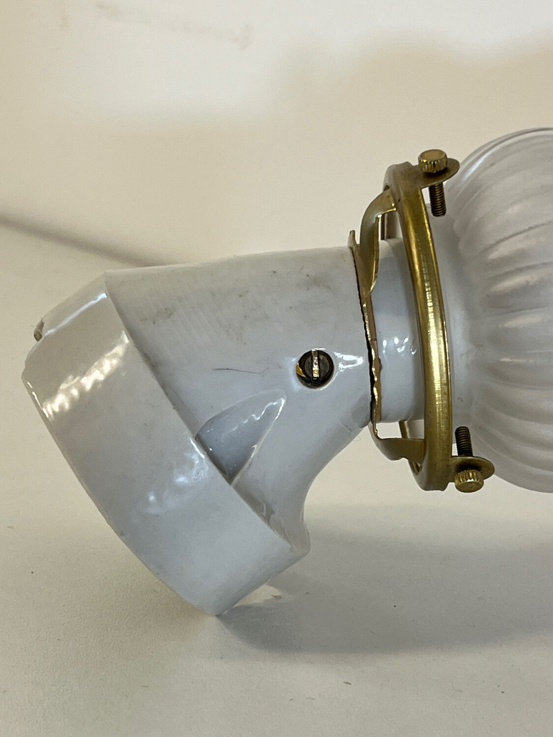 Pair of porcelain wall lights with pink glass tulips, Art Deco.