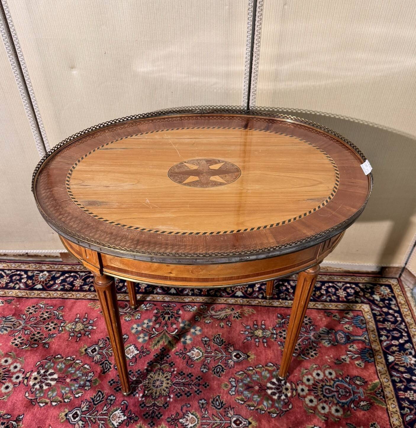 Louis XVI style bouillotte table in light wood and marquetry.