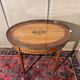 Louis XVI style bouillotte table in light wood and marquetry.
