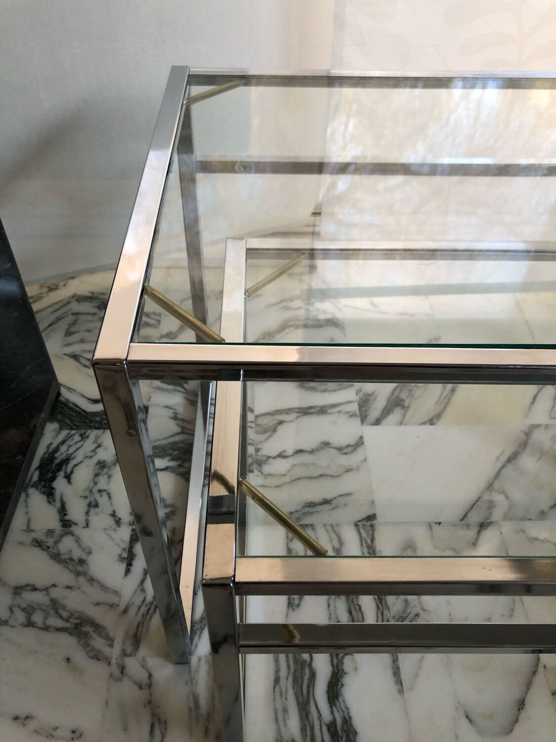Nested tables in chrome metal and glass, Italy circa 1970.