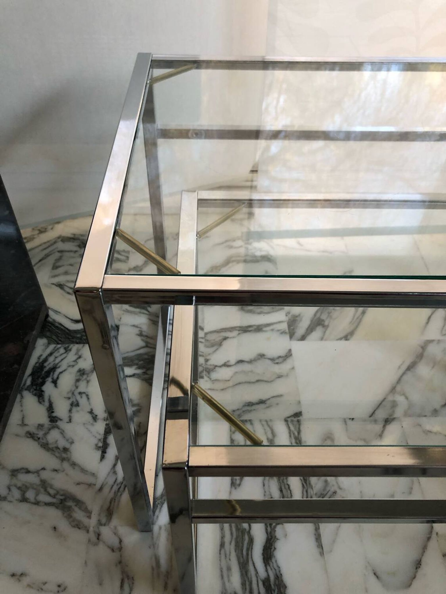 Nested tables in chrome metal and glass, Italy circa 1970.