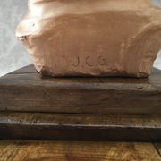 Bust in raw earth of atelier bust face of woman signed j.c.g.