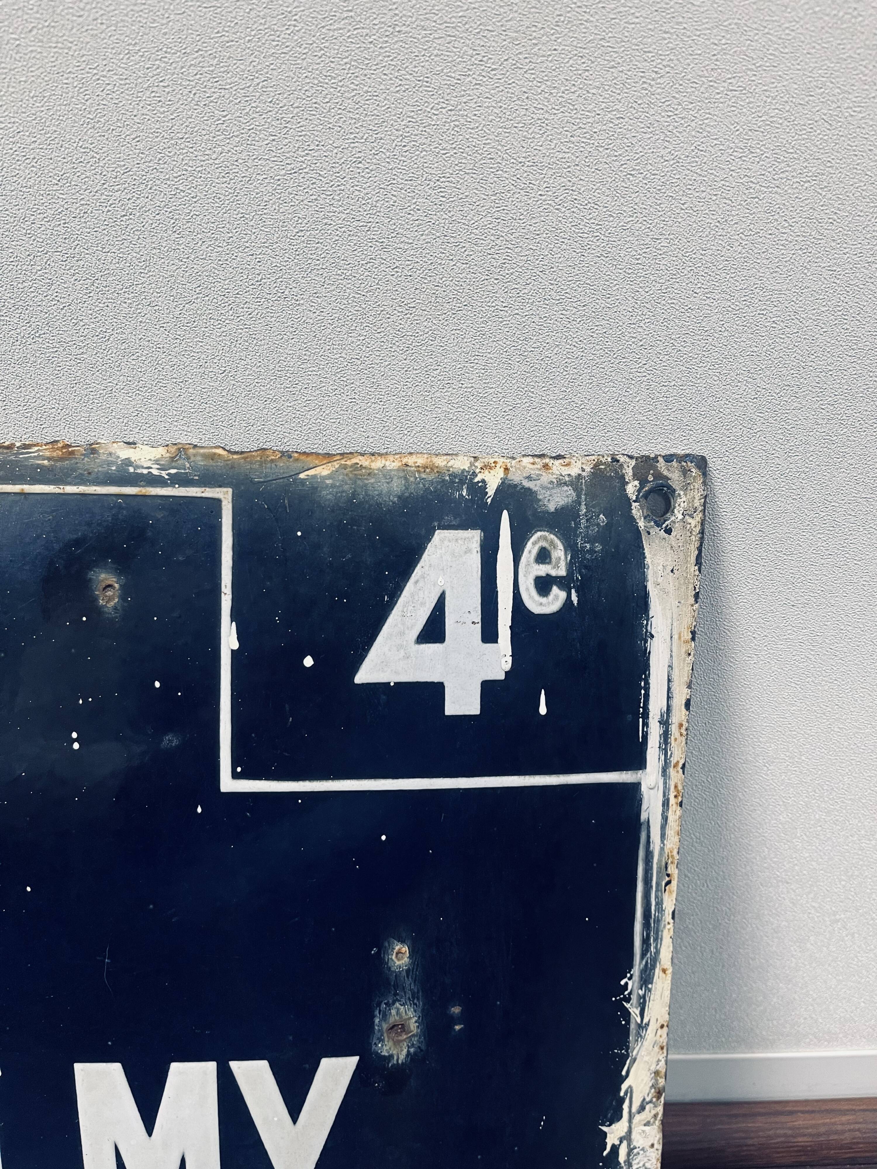 Enamelled street sign "Rue de Valmy"