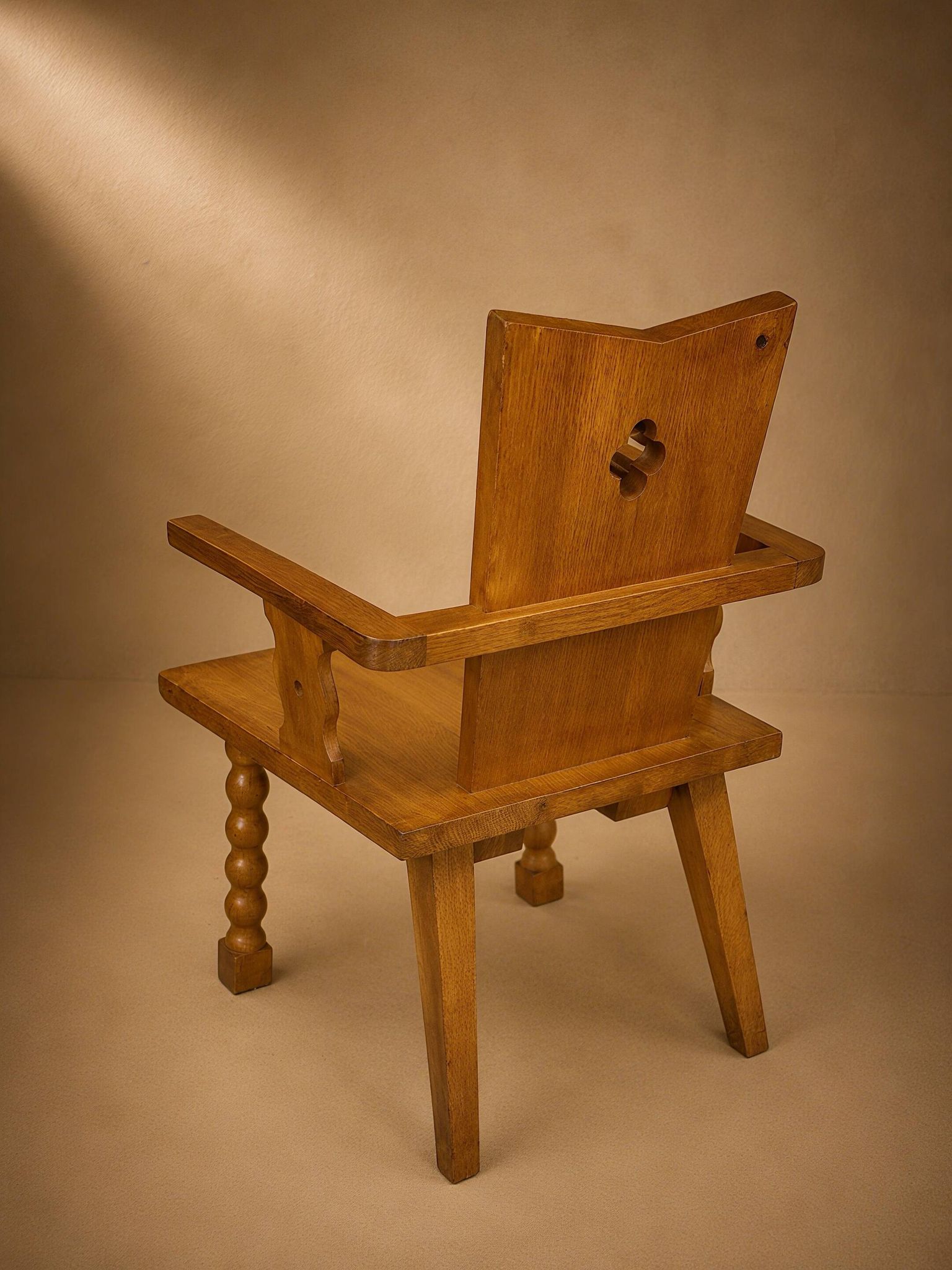 Pair of brutalist armchairs, oak, France, circa 1950.