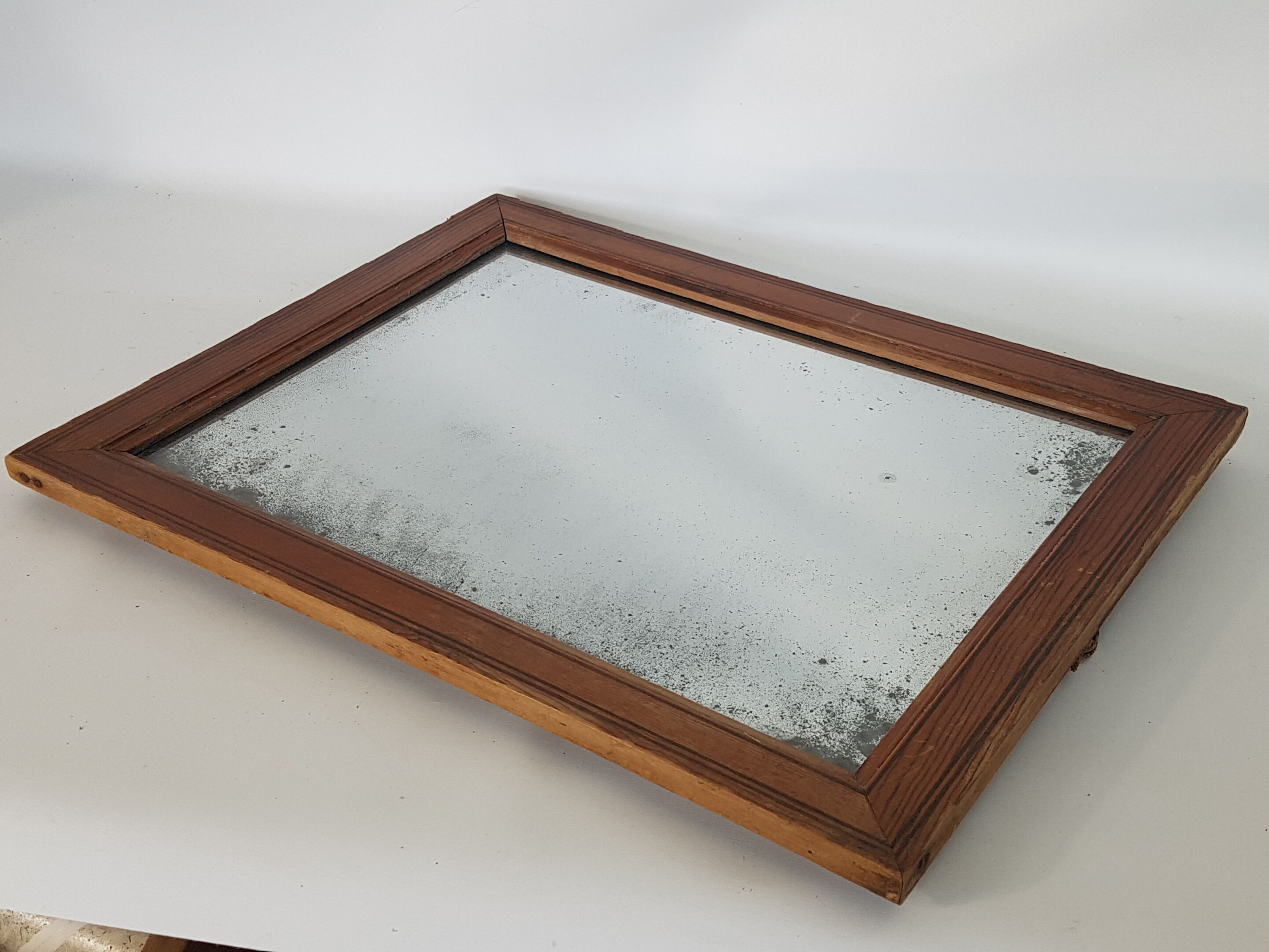 Old mirror in a netwood frame, 19th, 42 x 33 cm