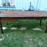 Farmhouse table and its two benches, chestnut, early 20th century