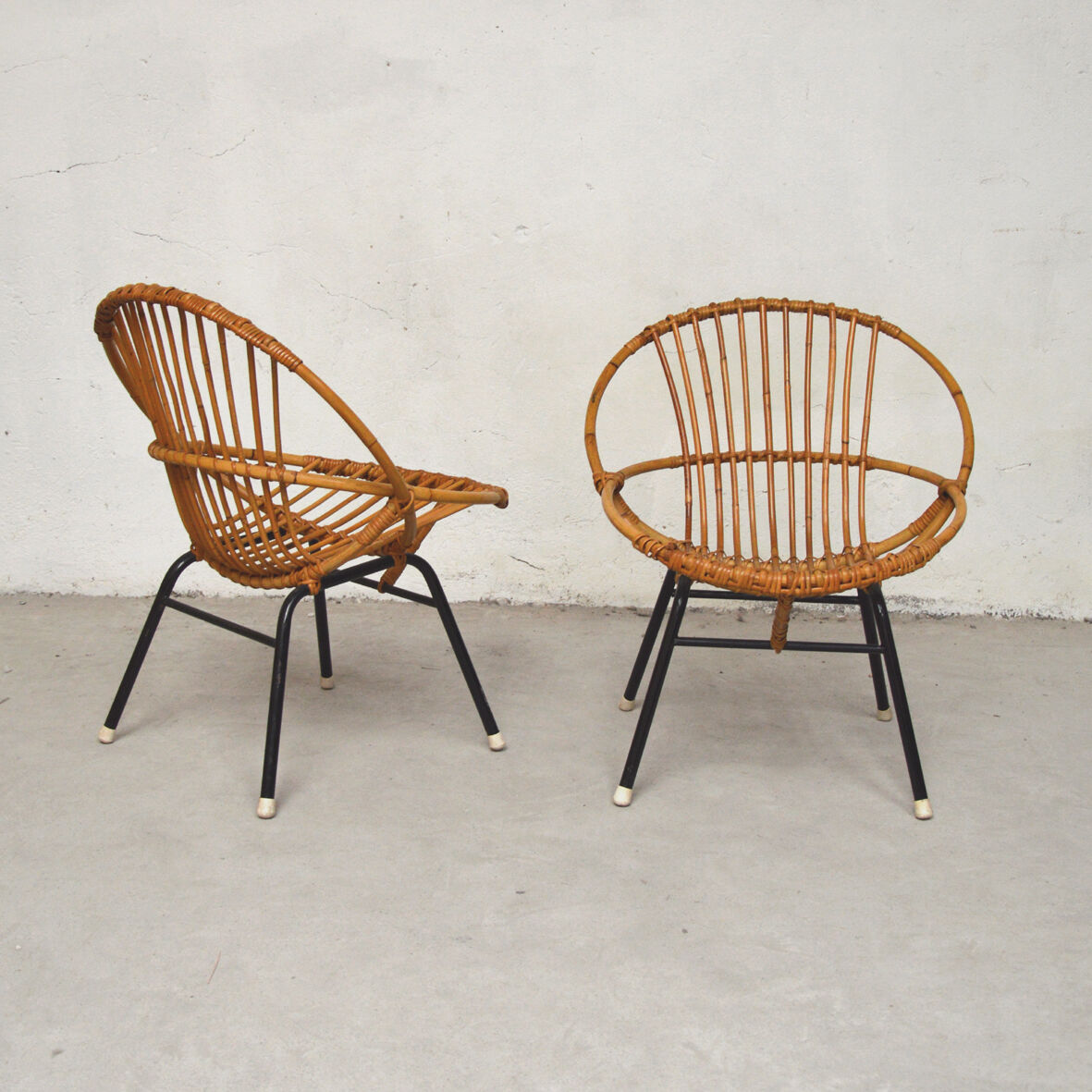 Paire de fauteuils en rotin et métal 1960