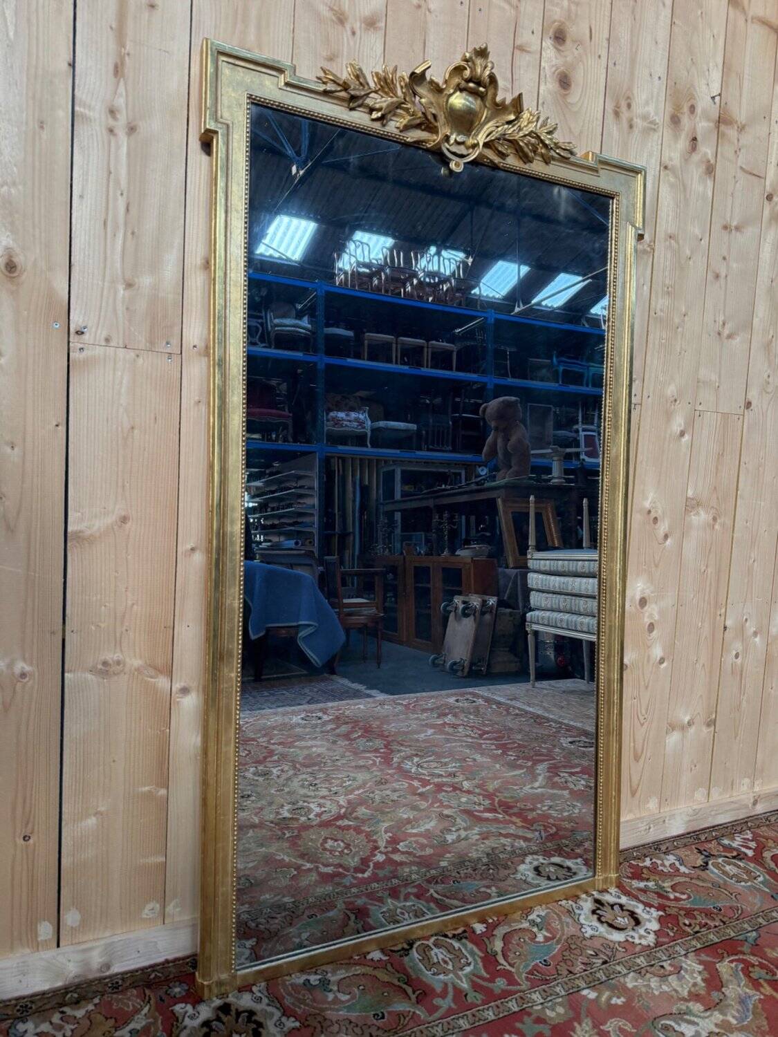 Louis XVI style gilded wood pediment mirror
