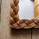 Woven rattan mirror