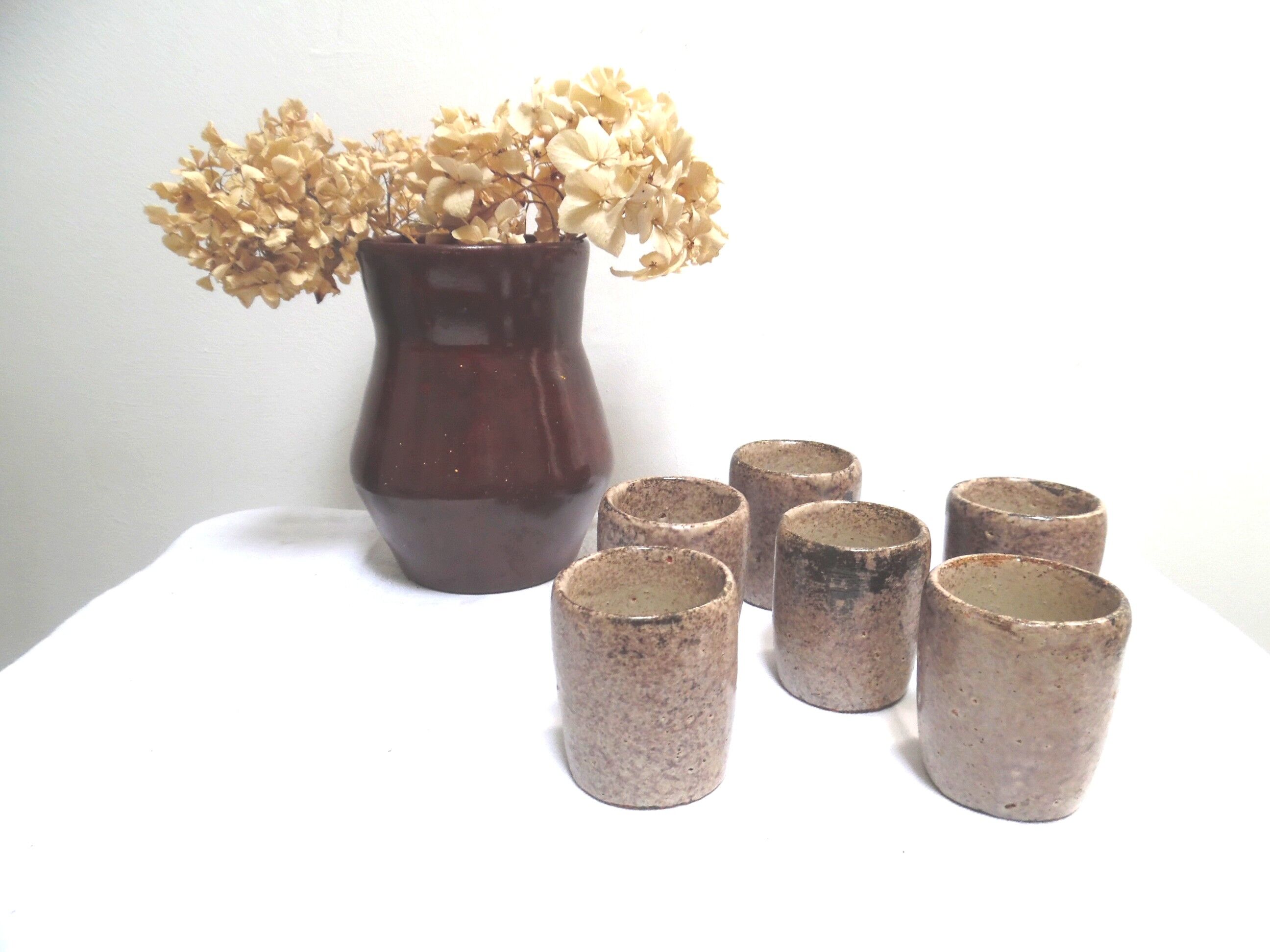 Six cups in stoneware