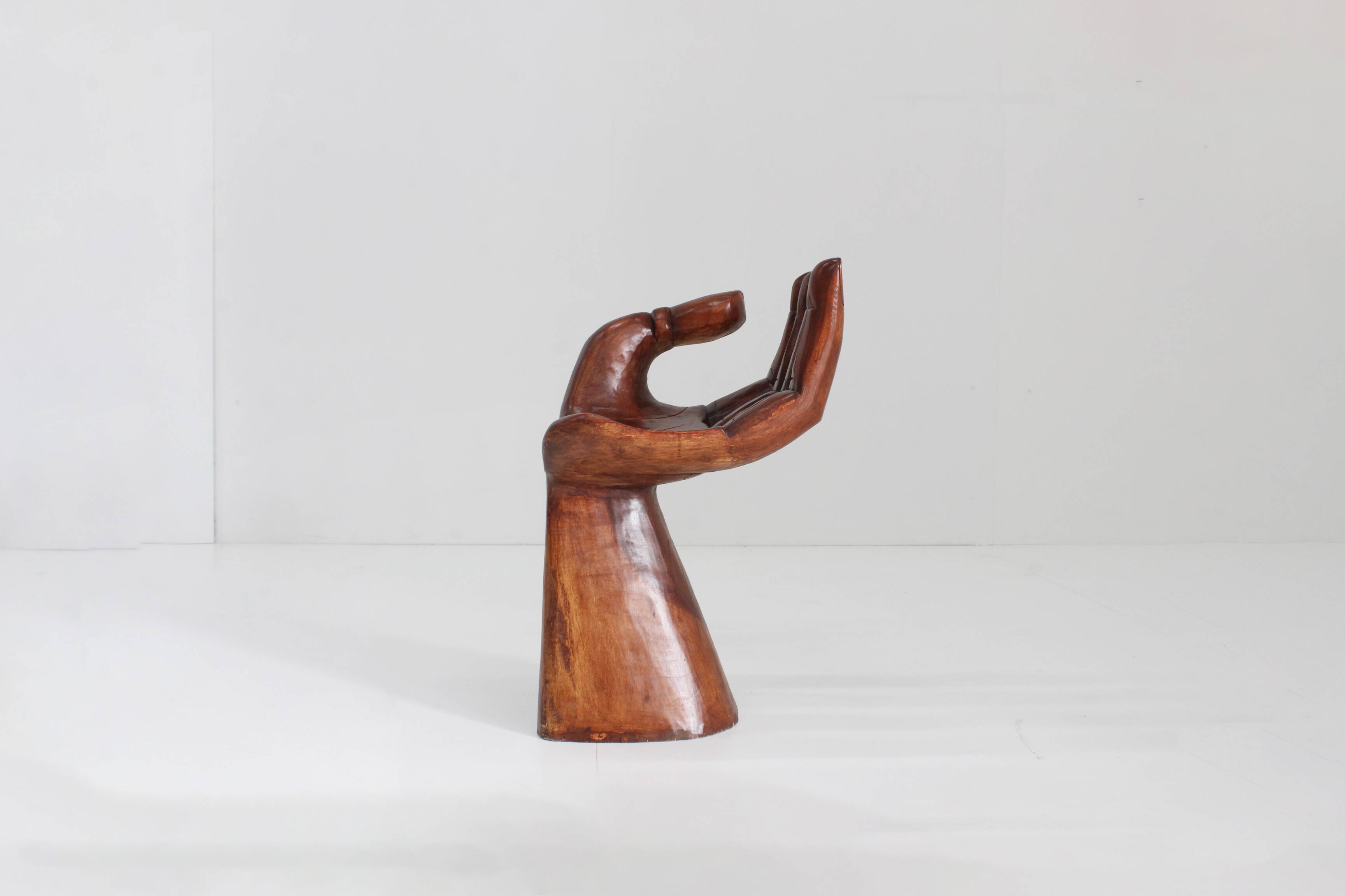 Sculptural wooden hand chair