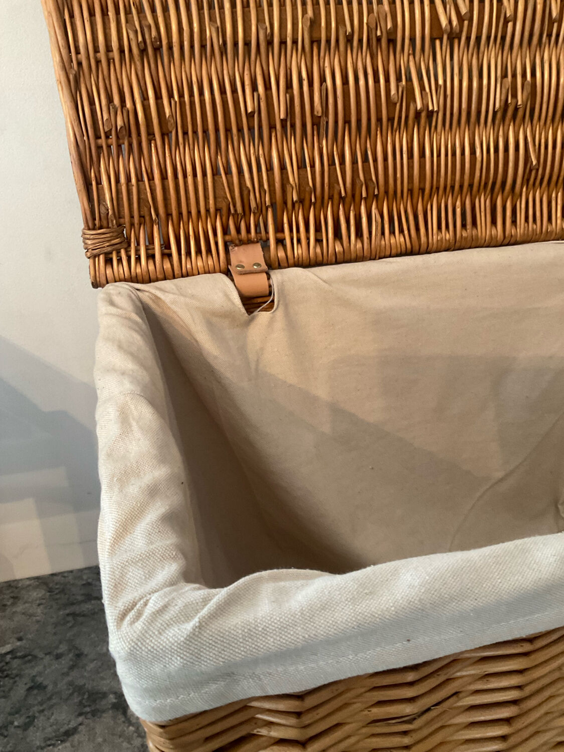 Woven wicker vintage suitcase