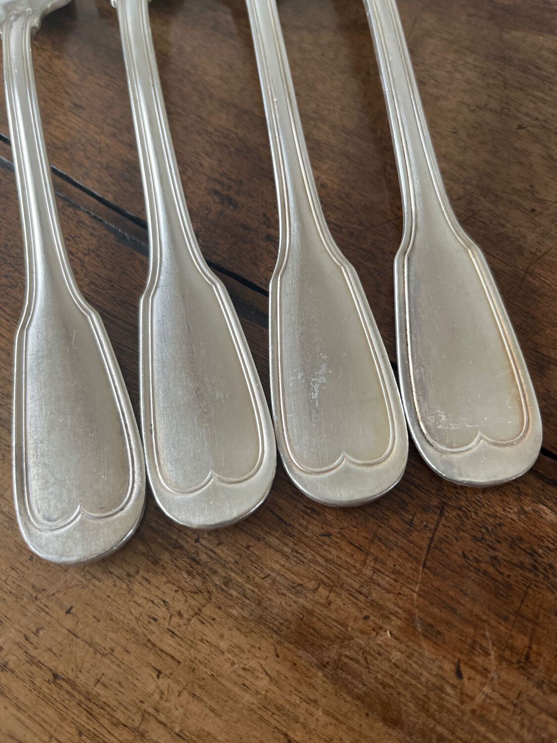 4 silver metal forks