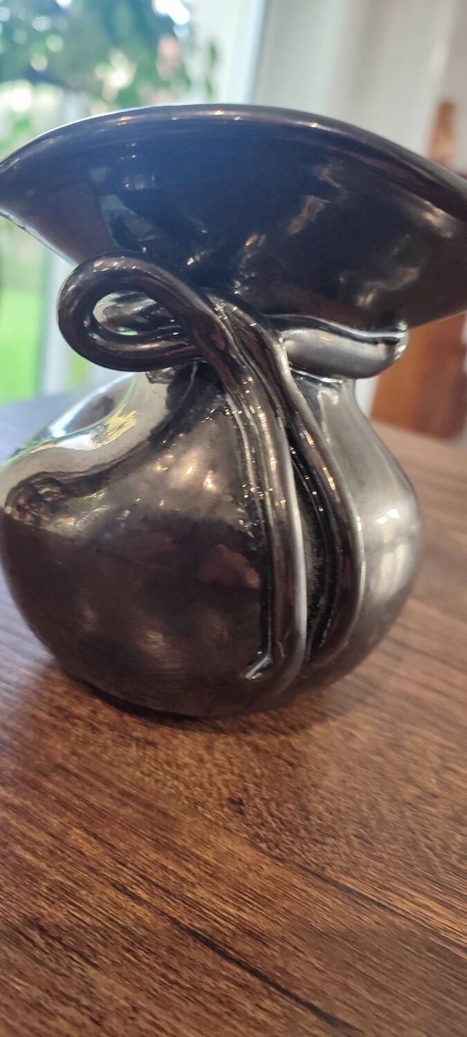 Iridescent ceramic vase from the 1960s, signed