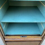 1970 oak office storage cabinet with curtains.