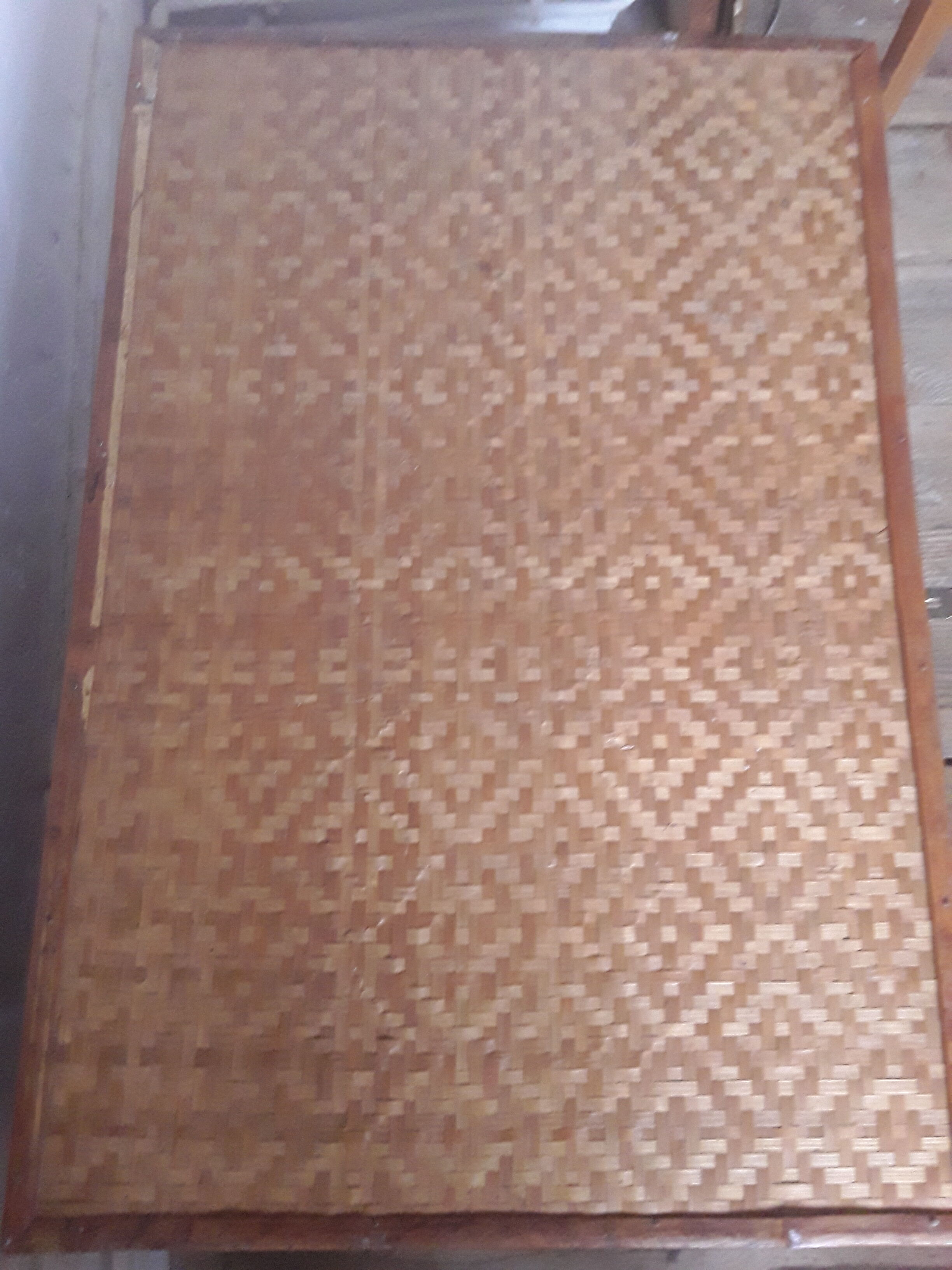 Wooden trunk with braiding