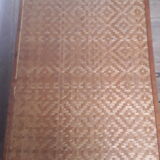 Wooden trunk with braiding