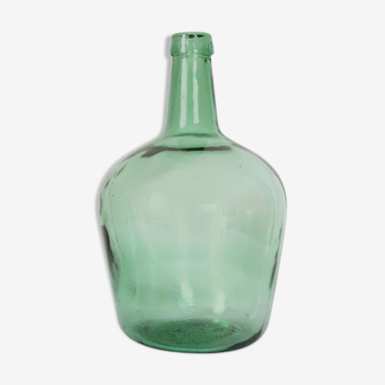 Demijohn in green glass