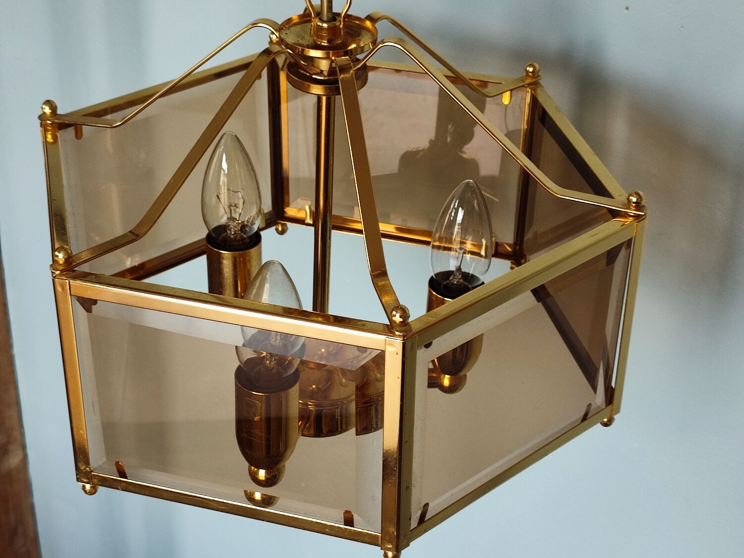 Brass pendant lamp and five-faceted vintage smoked glasses