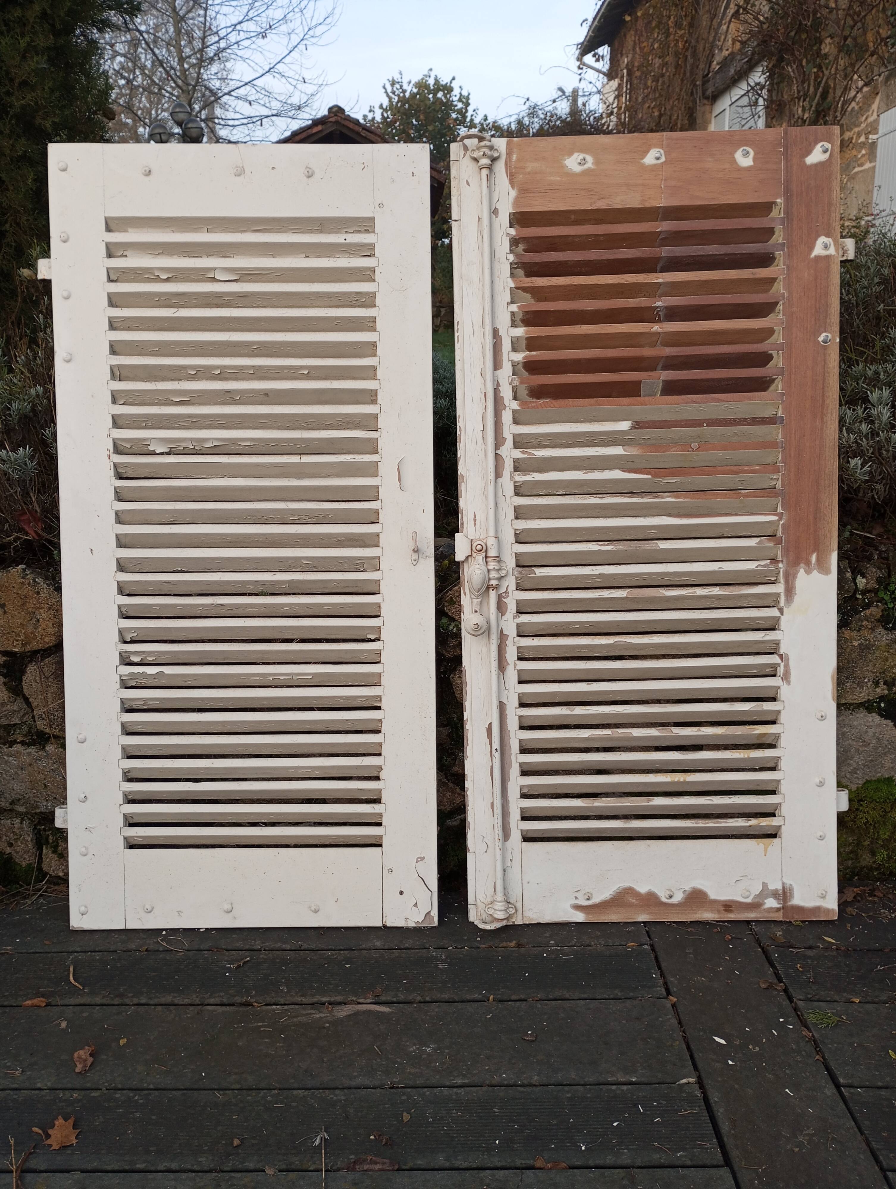 Pair of tropical wood shutters
