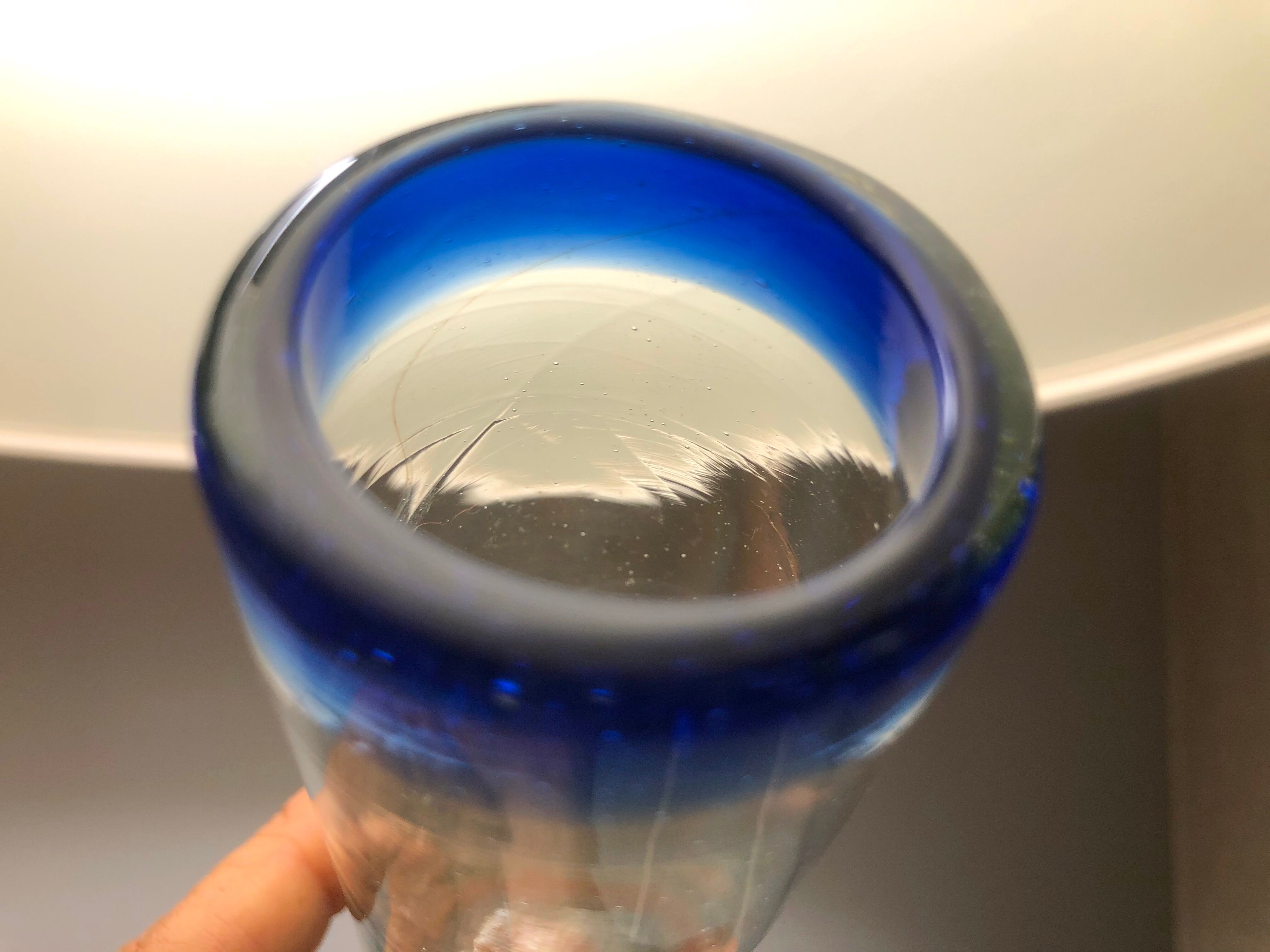 Handmade cobalt blue tequila glasses made of recycled glass