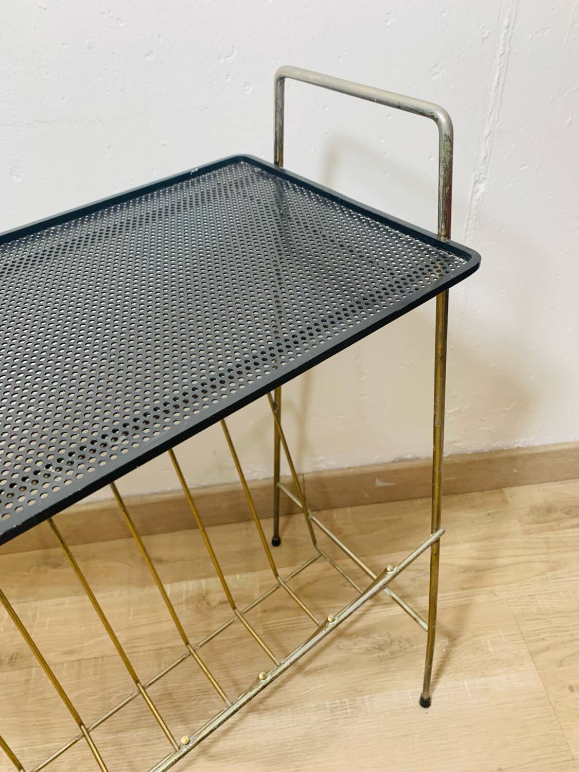 Perforated metal magazine rack