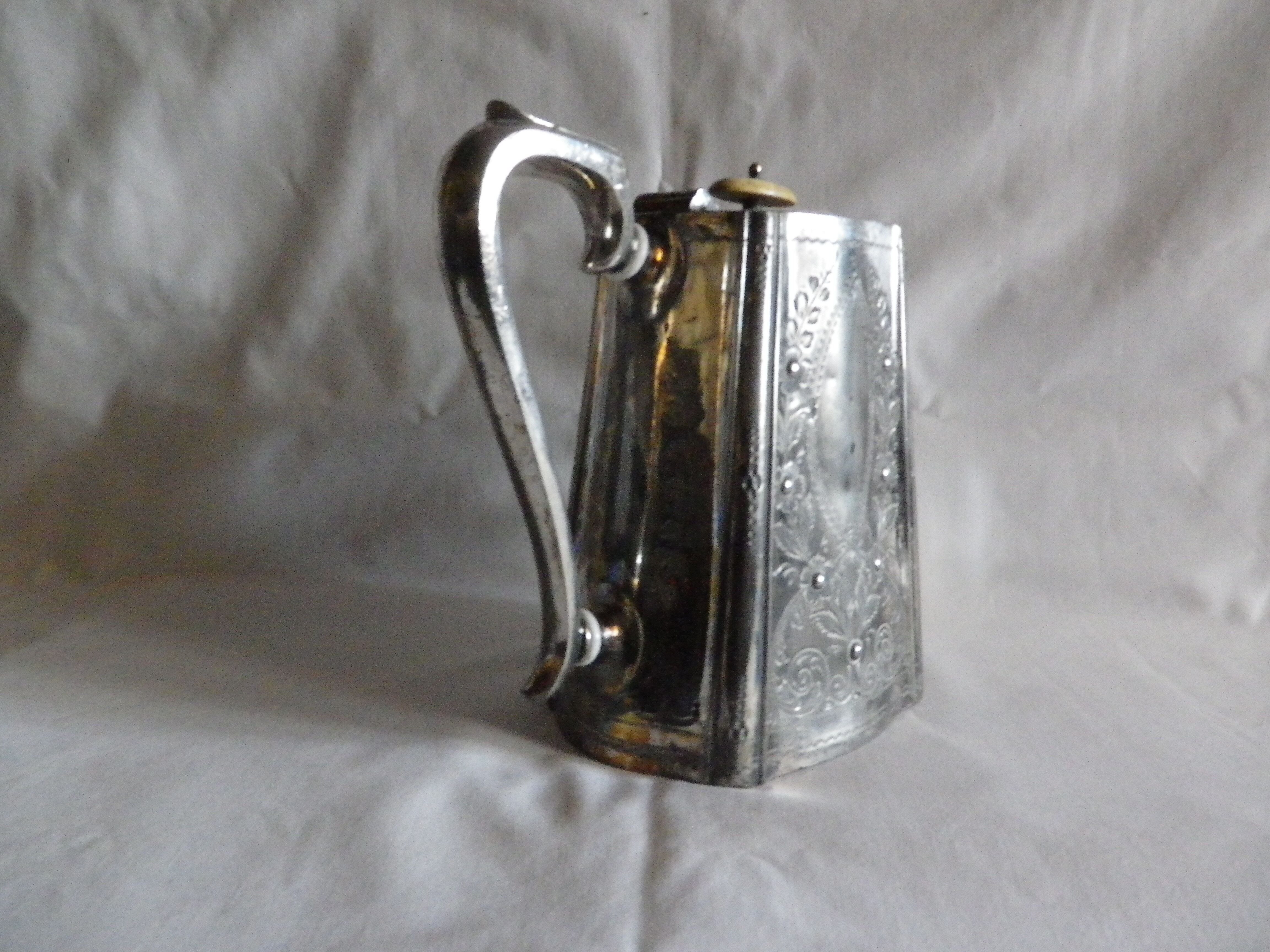 Silver metal coffee pourer