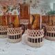 Service à citronnade 7 pièces vintage en verre ambré avec anse et contour en osier tressé