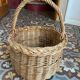 Round wicker basket in a bohemian style.