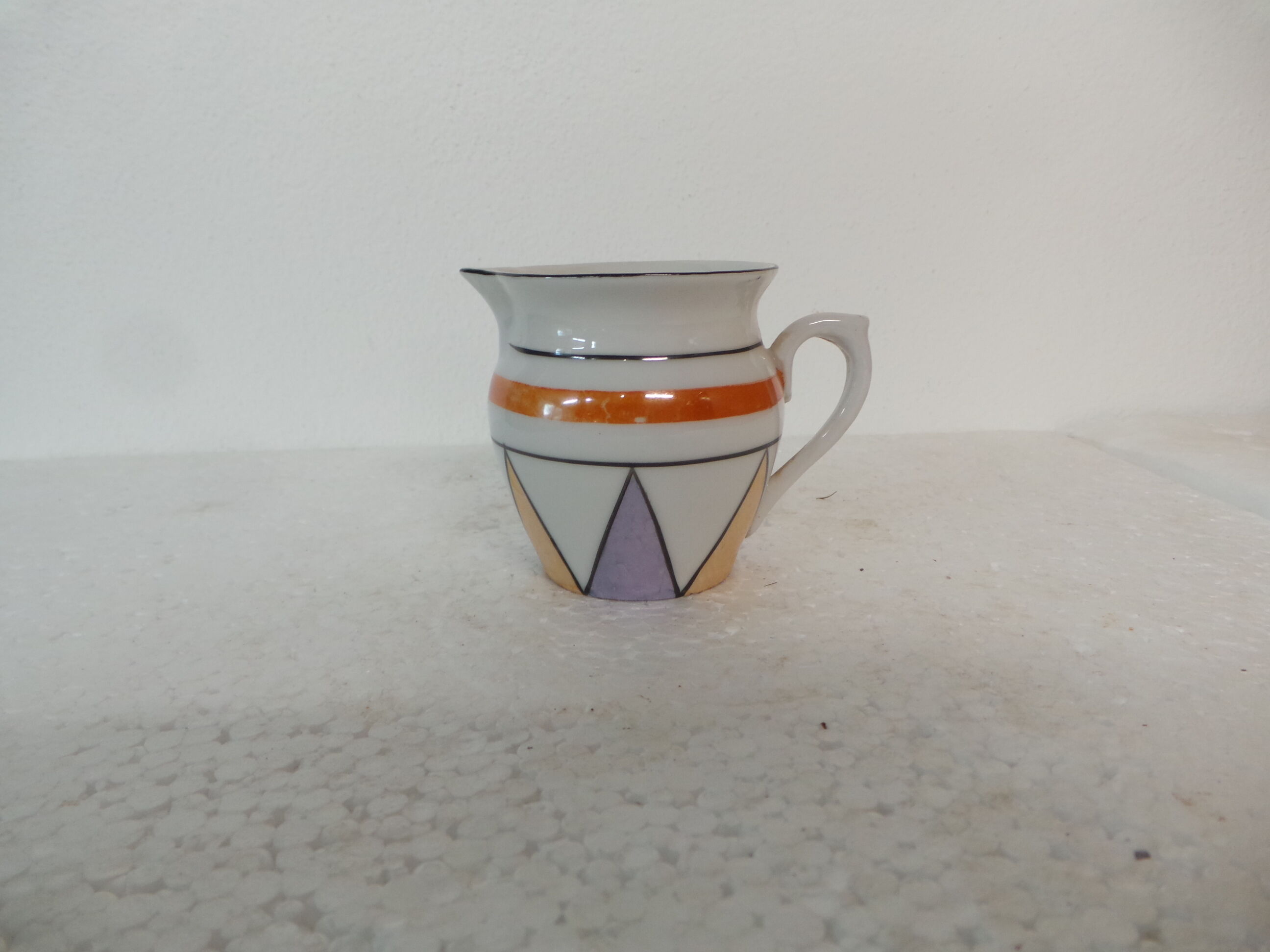 Small pitcher with milk art deco