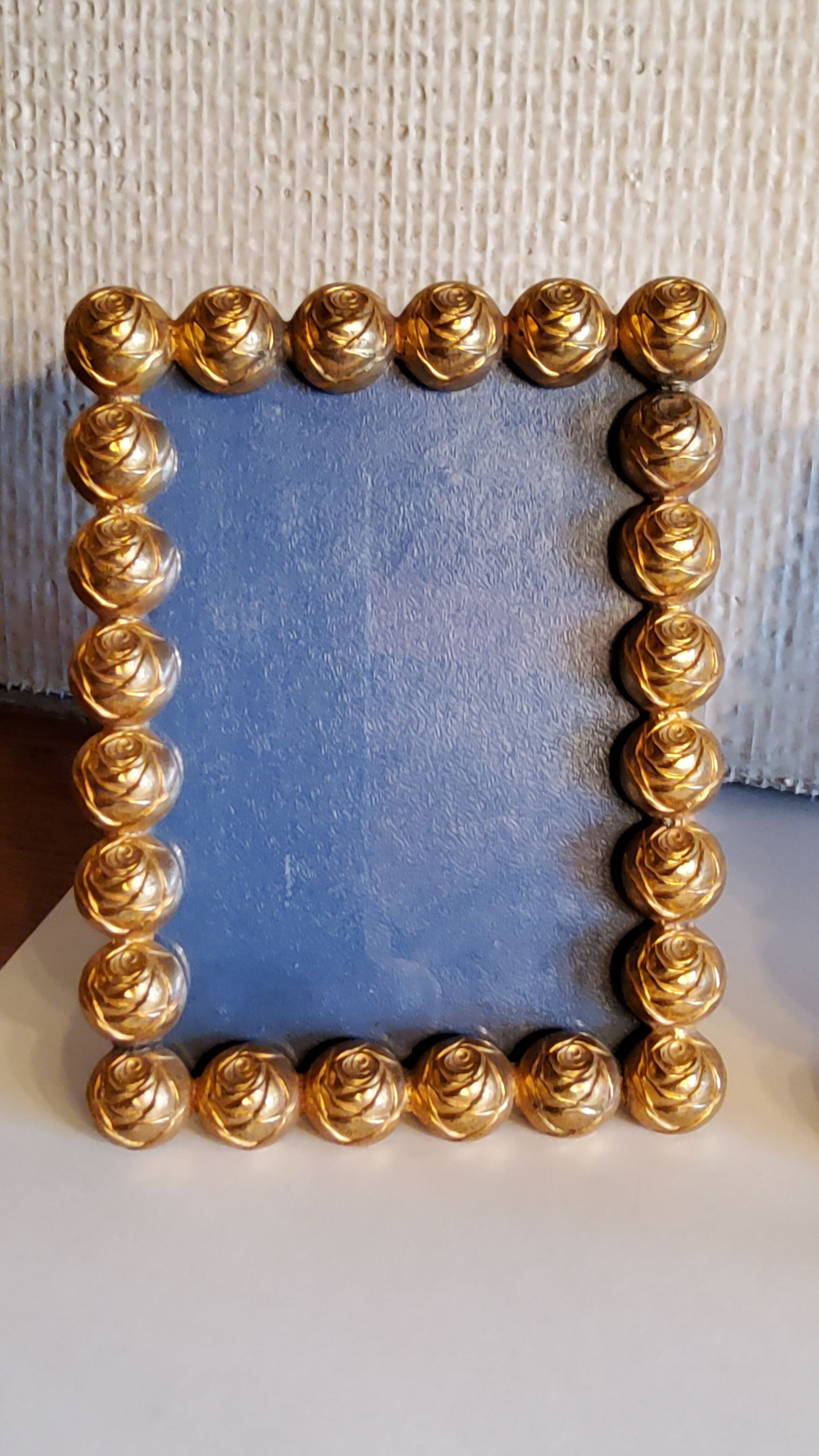 Pair of art deco photo frames in gilded bronze and gilded brass