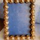 Pair of art deco photo frames in gilded bronze and gilded brass