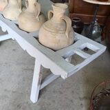 Antique painted wooden jar holder with 4 earthenware jars