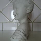 Laughing child bust after Donatello in Sèvres biscuit