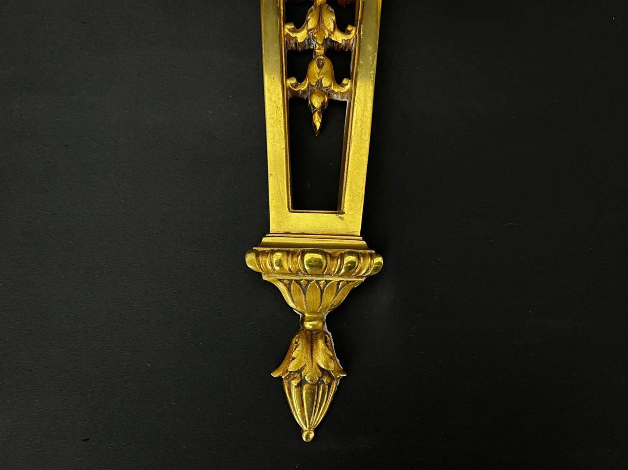 Large pair of gilt bronze wall sconces in the Louis XVI style.