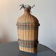 Wicker woven bottle