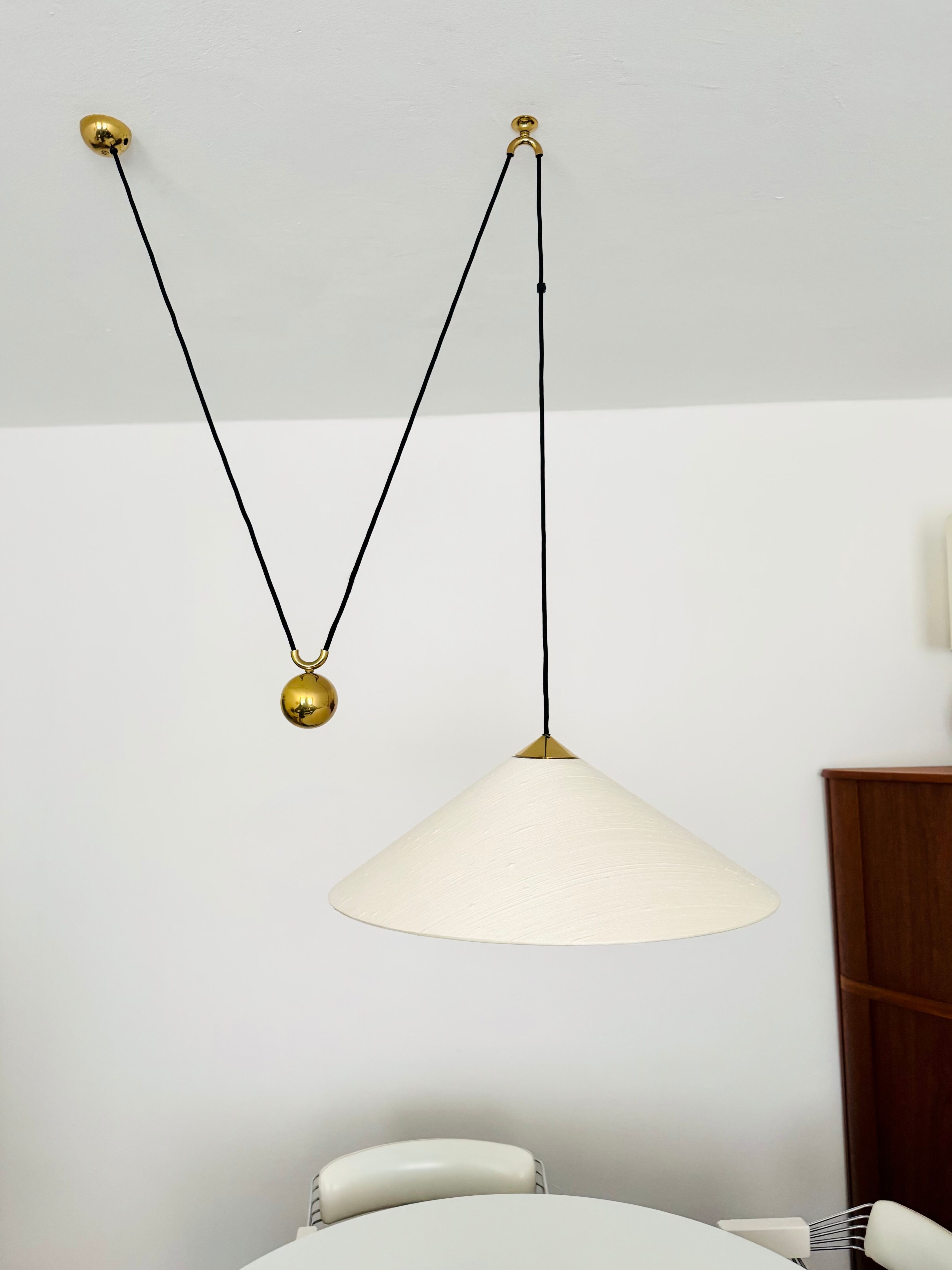 Large Adjustable Brass Pendant Lamp with Counterweight by Florian Schulz