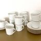 Coffee service with 11 cups and 6 saucers made of Limoges porcelain.
