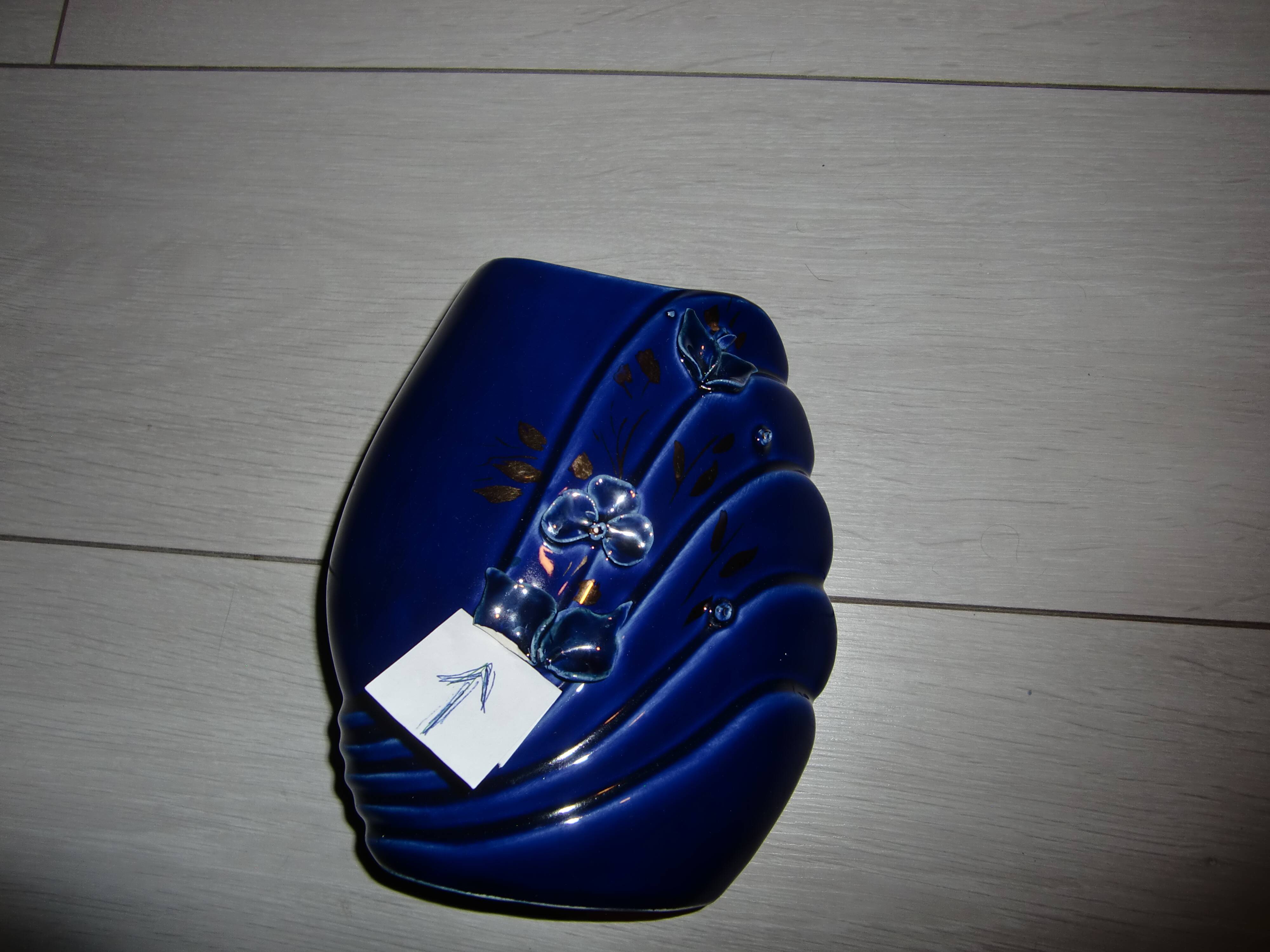 Blue lacquered vase with flowers & applied leaves