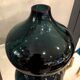 Onion shaped vase of green and blue color in glass