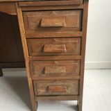 Accountant in solid wood desk