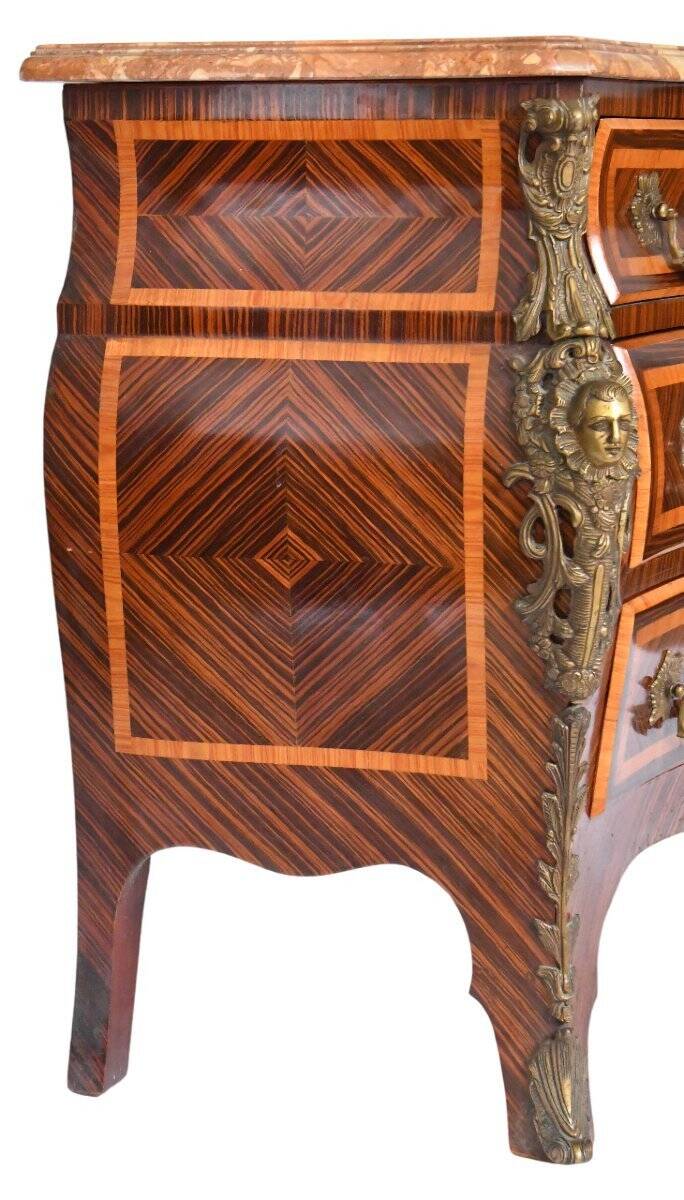 Tomb-shaped commode in Louis XV style with decoration featuring Spanish figures.