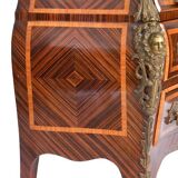 Tomb-shaped commode in Louis XV style with decoration featuring Spanish figures.