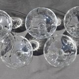 9 old champagne glasses in flat-waisted blown glass