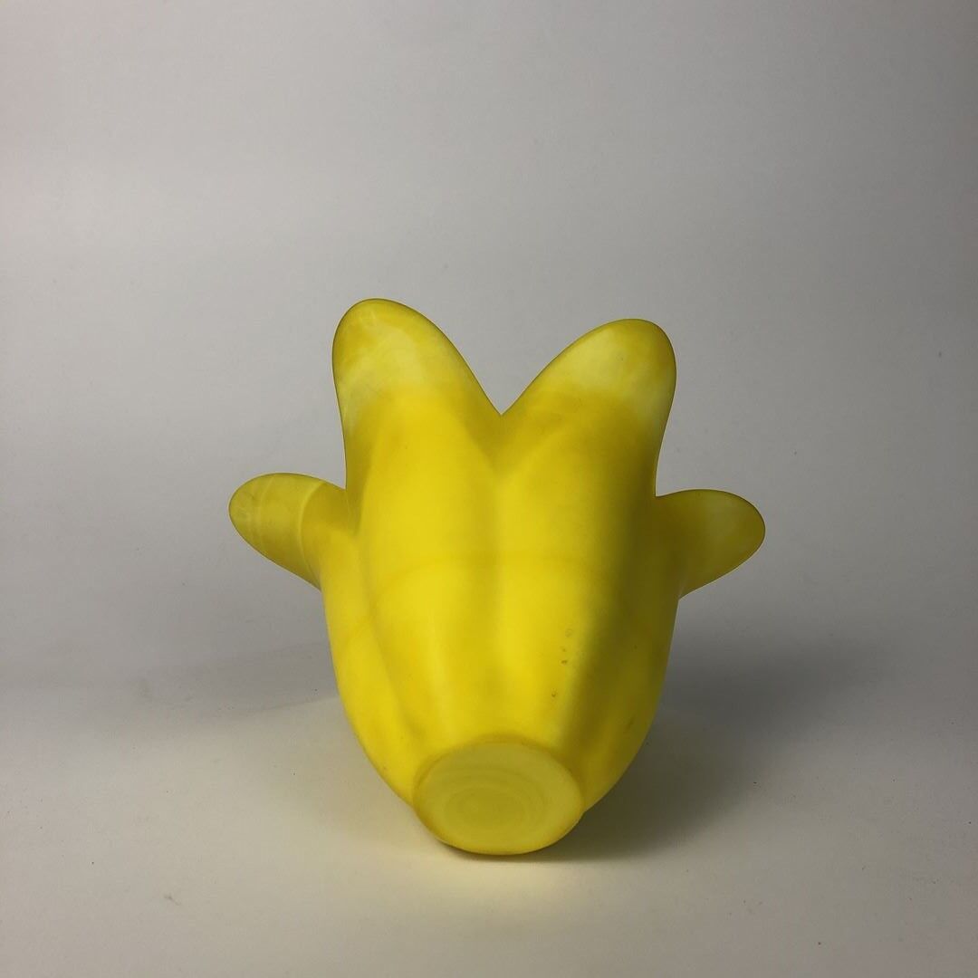 Small vase made of yellow glass paste, tulip shape blooms