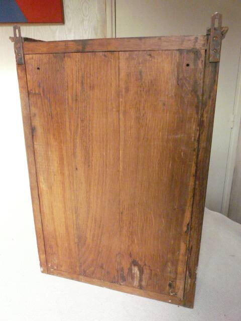 Old watchmaker's furniture wall display case