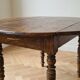 Antique solid wood drop-leaf dining table