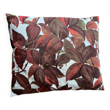 Vintage cushion with virgin vine leaf pattern.