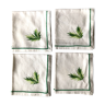 Series of four embroidered linen napkins
